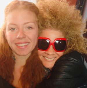Michaela Angela Davis Instagram - a lil ode to my afro on 
world afro day

my afro is a world
of naps holding tight to
each other 
reaching, rising up & out 
cacophonous curls 
refused to be ruled
linked & loc’d
forming a crown of gold
round my face 
roaring like a mane 
glowing like a halo 
my afro is the satellite 
to the ascended masters
the ancient ones 
the angels
the ancestors 
#WorldAfroDay #passtheCROWN