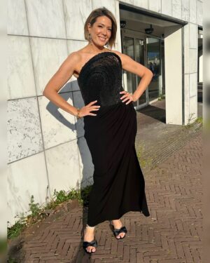 Michelle Collins Instagram - My main flaw is I am too obsessed with supporting the arts!! What a night at the @ypcoperaballet celebrating so much incredible talent. A special thanks to my Dutch ambassador @benfleetwoodsmyth for the invitation, @couturehippie an essential worker (wingwoman/photog) & one of the best @normanvladimir for letting me walk my first Dutch red carpet!! 😍
Dress: @gauravguptaofficial 
Jewels/bag: @prada 
Shoes: @stevemadden 
Hair/makeup: lil ol me 
Spray tan: Serbian woman in Stockholm 👑