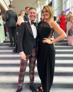 Michelle Collins Instagram - My main flaw is I am too obsessed with supporting the arts!! What a night at the @ypcoperaballet celebrating so much incredible talent. A special thanks to my Dutch ambassador @benfleetwoodsmyth for the invitation, @couturehippie an essential worker (wingwoman/photog) & one of the best @normanvladimir for letting me walk my first Dutch red carpet!! 😍
Dress: @gauravguptaofficial 
Jewels/bag: @prada 
Shoes: @stevemadden 
Hair/makeup: lil ol me 
Spray tan: Serbian woman in Stockholm 👑