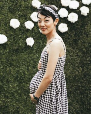 Michelle Kim McCoy Instagram - Happy Friday from the growing McCoy Family!! Creative direction   coordination by @kaileybhowell and @kirstenessiambre of @petalandfleur 🙌🏼
.
.
.
.
.
#pregnantstyle #matenityfashion #momtobe #mothertobe #mommyblogger #expectantmother #expectantmom #momfashion #mommyfashion #stylethebump #dressthebump #maternityshoot #maternityclothes #maternitydresses #cutematernityclothes #pregnancyclothes #ootd #babyshower #babyshowerinspiration