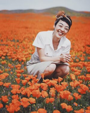 Michelle Kim McCoy Instagram - Super Bloom Pt. 2 {SWIPE} || When my mom sent me this photo of me as a good little Korean squinting and squatting in Lancaster over 25 years ago I knew I had to go back during #dluxsabbath to recreate the image. My mom’s favorite pastime was taking photos of me with flowers. We had many a photoshoot in our own personal rose garden and you better believe that whenever there was a fresh bloom in sight, we would pull over for an obligatory photo. I’m pretty sure I hated it as a kid but I’m also convinced that this is why I have chosen the career path I have 😅 Mom always said, “You’ll thank me one day”...and sure enough, the moral of the story is: Mom is always right 🤦🏻‍♀️
.
.
.
.
.
.
#neverstopexploring #welltraveled #alifetolive #wanderfolk #letsgosomewhere #getlostclub #alwaysadventure #thatsdarling #darlingmovement #thehappynow #livethelittlethings #liveauthentic #loveauthentic #livefolk #artifactuprising #theeverydayproject #peoplescreative #thepursuitofjoyproject #nothingisordinary #vscodaily #creativehappenings #superbloom