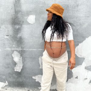 Michelle Mitchenor Instagram - Muvahs How y’all feel? Fathas yall alright?  Fun Preggers facts below 🤍

1. I’m waiting on delivery for gender & it’s so fun! 

2. I’m in my 3rd Trimester & 3rd Pregnancy in 2yrs - Talk to me nice..Or else 😎😏😒

3. I’ve been taking prenatal Pilates @laspringspilates and it’s EVERYTHING ! Highly recommend prégnant or not, their classes are ❤️‍🔥

4. My waistbeads are blessed from @turquoiseandsalt . I had a private tying ceremony with the creator & I’m obsessed 🤍. Get into your womb healing ladies whether you’re pregnant or never plan to be~ as everything we do flows from it. 🌎

5. My Birth team is a dream come true! @phabulouscare (holistic OBGYN) 
doula - @lovinglylatched (which just so happens to be 1 of my best friends @moments_matter ) & my virtual preggers group #Mindfulmommas spearheaded by @lbreggy. Def sign up if you’re anywhere in the world and want info on all things mommaHOOD. 

BONUS* Hair by @consciouscurlshair x @bonitarebel (locs)❤️‍🔥
@theninjafilter on the face! 

As y’all can see by the end of the slides my toddler boss (1st born) Noir is calling me soooo let me get back on my job 🤸🏾‍♀️

#coolmom #bonusmom #noirsmuvah #foreverserenity👼🏾#thirdtrimester #naturalbirth