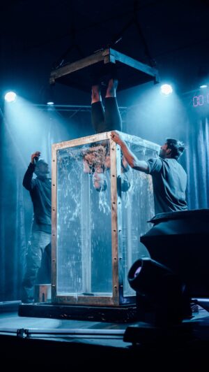 Michelle Khare Instagram - For 6 weeks I trained with freedivers, magicians, and engineers including @MarkRober to attempt to escape one of Harry Houdini’s deadliest tricks. Now live on my channel! 🪄