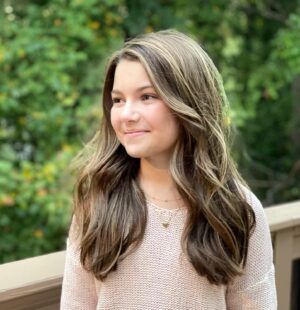 Mila Harris Instagram - "The most beautiful thing you can wear is confidence"- @blakelively 💗Thank you @hairandstylesalon for the boost! #confidence #beauty #style #hair #love #highlights #girlpower #feel #good