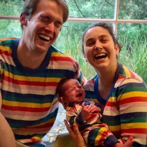 Molly Ephraim Instagram - Our first attempt at being matching pajama people. Probably our last. Introducing… Zia! Born 12/1/21 and not a fan of cheesy family portraits. Wishing you and yours a very boosted New Year!