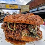 Molly McCann Instagram - ☘️ PADDY’S WEEKEND SPECIAL ☘️ McCann’s Guinness Beef Sub 🤌🏻 Braised beef shin in a Guinness gravy, with garlic and herb butter crispy potatoes, jammy Guinness onions and confit garlic and parmesan aioli served on a homemade sub 🤩 Available Saturday & Sunday @balticmarket 💚🍀
