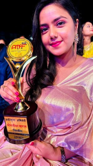 Monalisa Bagal Instagram - So honoured to receive the ‘Best Actress’ Award in #AmbernathMarathiFilmFestival for #BHIRKIT ✨

This means a lot to me. Thanks to my extended family for their love ❤️ #anighttoremember ✨

Styling-Outfit : @aditya_dudkekar @labelbymanjushakunjir 
Makeup : @globalmakeover_ 

#award #awardwinning #feeling #bestactress #happy #momentsofmine #reels #happyface #reelsinstagram