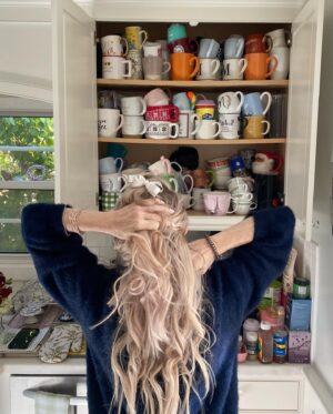 Monica Potter Instagram - Everyone is amazed at my wall of cups as I like to call it. One for every holiday one for every season and one for every personality for every friend and family member and myself.💗🎀