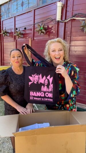 Myf Warhurst Instagram - We have merch! Bang On Live has kicked off and we got to lay our hands on the beautiful posters, tea towels, and totes we’ll be selling at all shows!

Come and see us, we’ll be hanging out after each show doing signings and selfies. And… more merch to come!

Show art by the wonderful @no_hassles_just_tassels 

Get tickets via the link in bio. 🩷🧡🩷🧡