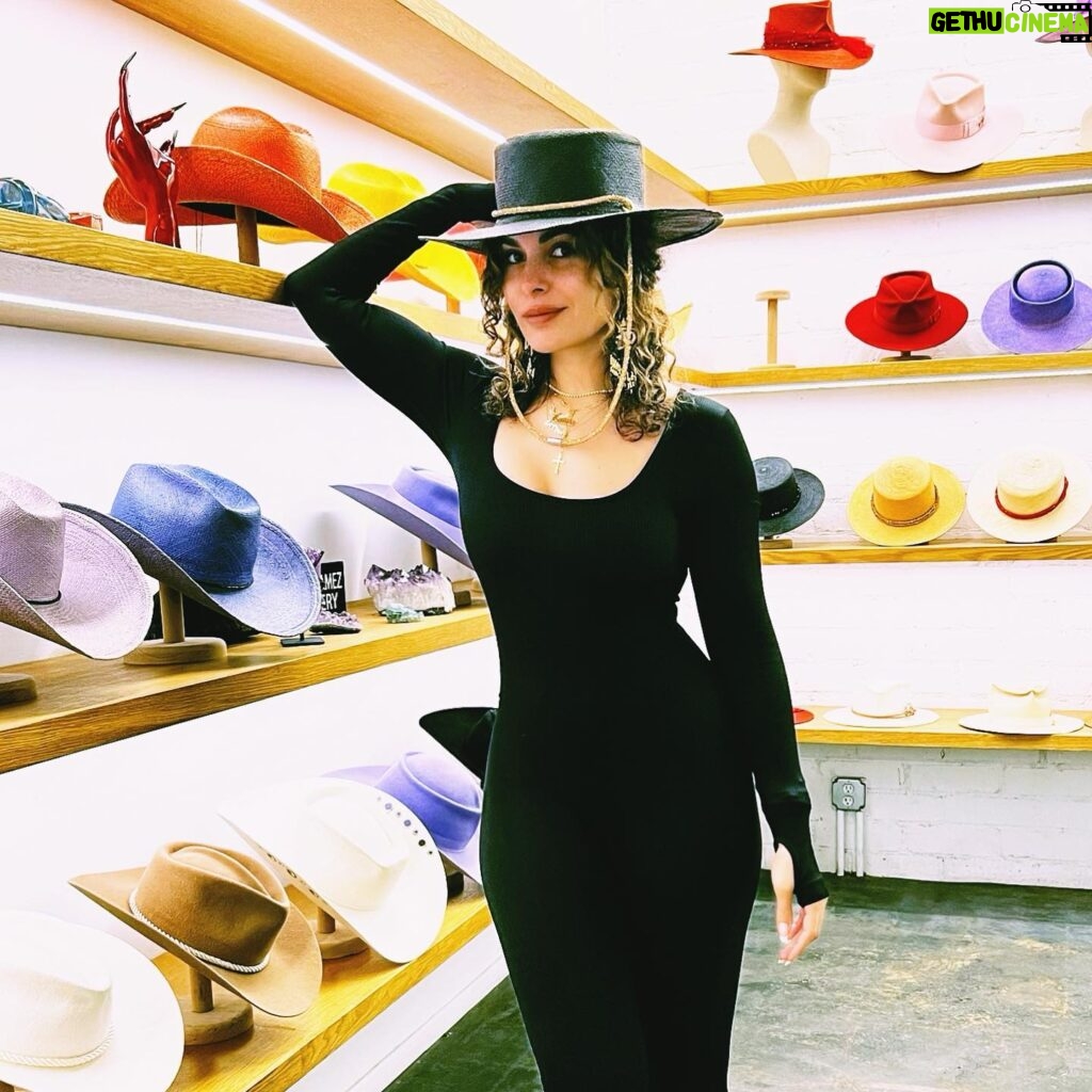 Nadine Velazquez Instagram - Sexy|Simple is my favorite color. Epic hats by @gladystamezmillinery