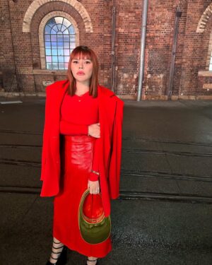 Nakkiah Lui Instagram - dressed liked the Aboriginal flag ❤️💛🖤 for @davidjonesstore Indigenous Fashion Projects Runway. Did I succeed? Are you giving our land back? 😘

jewels: @cartier 
Aboriginal flag necklace: @hausofdizzy 
top: @camillaandmarc 
mua: @leitai 
hair: @taylorjameshair