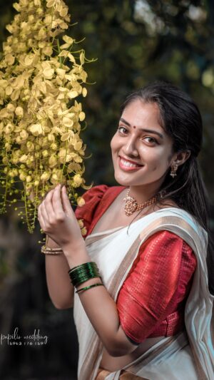 Nandana Rajan Instagram - Vishu is here ….. 

video credits: @tony_manniplackan_photography @papilio__wedding 
@__carlo._____ 
Edits : @amal_ranjan