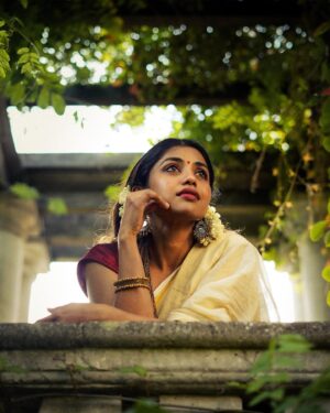 Nandini Sree Instagram - The golden streaks of saree seamlessly blended into the European landscape of the Pergola.. the sun kissed happy hour created the perfect frame for this beautiful series by @blooomf ❤️!!!

#photography #nandinisree #photoshoot #onam #onamsaree #aestheticphotography
