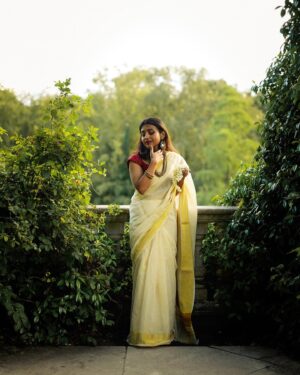 Nandini Sree Instagram - The golden streaks of saree seamlessly blended into the European landscape of the Pergola.. the sun kissed happy hour created the perfect frame for this beautiful series by @blooomf ❤️!!!

#photography #nandinisree #photoshoot #onam #onamsaree #aestheticphotography