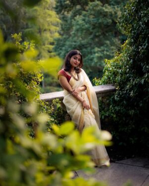 Nandini Sree Instagram - The golden streaks of saree seamlessly blended into the European landscape of the Pergola.. the sun kissed happy hour created the perfect frame for this beautiful series by @blooomf ❤️!!!

#photography #nandinisree #photoshoot #onam #onamsaree #aestheticphotography