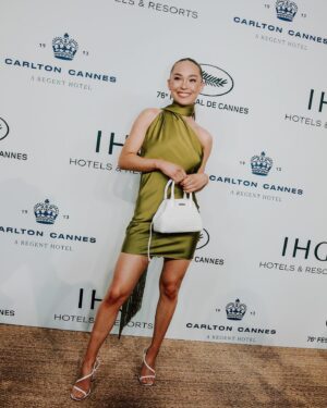 Naomi J. Ogawa Instagram - I call this my little olive 🫒 look! I had the most beautiful time in Cannes. Thank you so much for such a magical trip… 

 @IHGHotels
@CarltonCannes @condenasttraveller @itch_media 

Wearing:
Dress @ratandboa 
Bag @aspinaloflondon
Heels @stevemadden