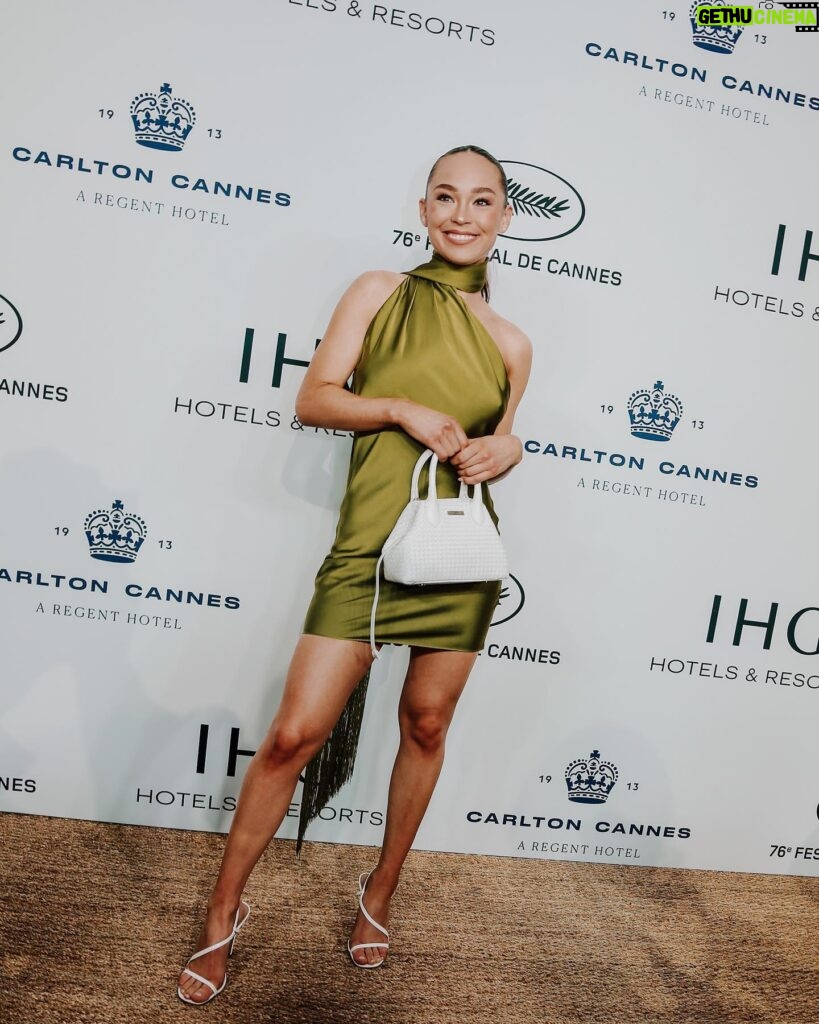 Naomi J. Ogawa Instagram - I call this my little olive 🫒 look! I had the most beautiful time in Cannes. Thank you so much for such a magical trip… @IHGHotels @CarltonCannes @condenasttraveller @itch_media Wearing: Dress @ratandboa Bag @aspinaloflondon Heels @stevemadden