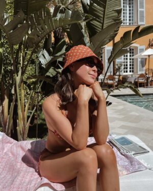 Naomi J. Ogawa Instagram - Lately I’ve been dealing with a lot of anxiety. Which isn’t fun! I had to take a break from the pod but I promise I will be back soon with a new ep! I can’t stress enough how important it is to take care of yourself! Sometimes in the middle of life’s madness, it’s important to reconnect to things that spark joy 🧡 (like this bucket hat) 🤭