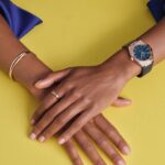 Naomie Harris Instagram - Things are brightening up with @omega and the iconic #omegaconstellation . Along with the sensational watch in blue, their 18K gold jewellery helps complete the look. #ad