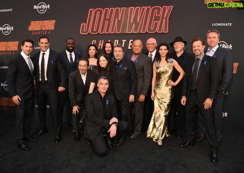 Natalia Tena Instagram - @johnwickmovie hit LA last night @chinesetheatres! Absolute dream team @liongate. Thank you so much @karenclarkson for lending me an epic gold dress and tail (that I managed to not trip up on once) and for @melaniemakeup @sapongjohnnie for spending all day with me glamming my jet lagged face into shape. Also to @hardrockla for the neon lights and sake flights. Everyone go see it on the big screen from the 24th of March!