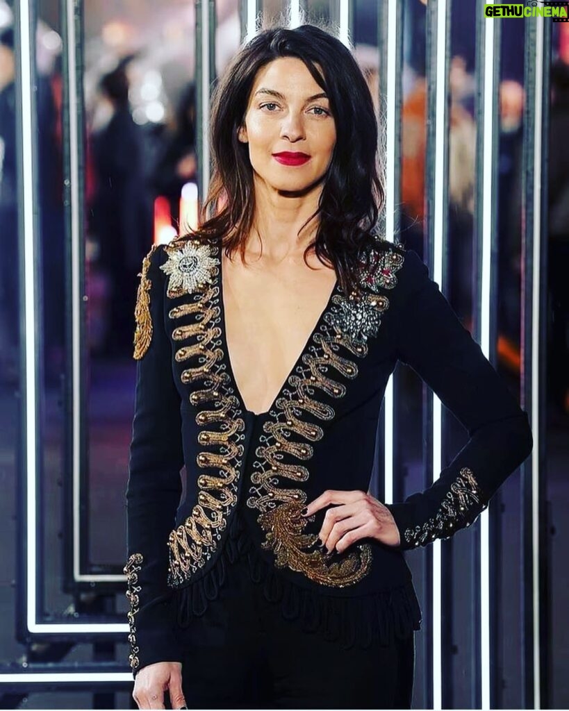 Natalia Tena Instagram - WHAT A NIGHT, WHAT A FILM! Felt like I had been punched in the adrenal gland for 3 hours and loved every single minute of it. I cannot believe I got to be part of this incredible action franchise @johnwickmovie @lionsgate and worked with these talented humans @chadstahelski. Thank you @karenclarkson @byeethedesigner for such a beautiful outfit (and for introducing me to tit tape 😂) and @jonchapmanhair @carolinebarnesmakeup for scrubbing me up and giving me the confidence to walk that red carpet. Also to all my wonderful idiot friends for coming to support my face and help me drink too many cocktails at the afterparty ❤️