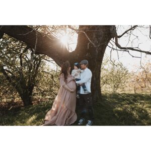 Natalie Krill Instagram - Life is truly a magical rollercoaster. We couldn’t be more excited about our newest additions. Turning our little family of 3 into a family of 5. 
This July we will welcome our little twins 💕 
Good one, universe 😉
The biggest thank you to our dear friend @innersolsticephotography for capturing these moments for us. 🤍🤍🤍
My beautiful dress courtesy of @valley_of_wanderlust 
🤍🤍🤍
