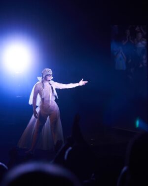 Natasha Khan Instagram - The Motherwitch is here {{{🥚🌀🥚}}}

Returning to a London stage last night was unforgettable. The energy, the love, and being surrounded by family and friends old and new 💫

Thank you to everyone who came and shared your night with me, you fuelled every moment of the performance. 

My deepest gratitude to everyone who made this show possible, to the fans, to @christineandthequeens for inviting me to do Meltdown at @southbankcentre and to @avalon9000 & The Charm for supporting. 

📸 @milovangiap 

Musical Director: @benchristophers 
Viola / Violin / Vocals: @violetavicci 
Live Arrangement: @batforlashes @benchristophers @violetavicci 
Live Creative Director: @hannahmarshall_______ 
Live Creative Assistant: @junsong___ 
Lighting Director: @joshieharriette 
Movement Director: @alexandra_green__ 
Creative Producer: @tigerhaginoreid 
Costume Designer: @juicylames 
Costume Designer: @agrostudio_ 
Crochet Maker: @maddyrara 
Set design: @zoeklinck 
Hair: @moemukai23 
Management: @giantartistmanagement @tigerhaginoreid @richaustensmith @islafab 

More exciting news to come….. 🦇