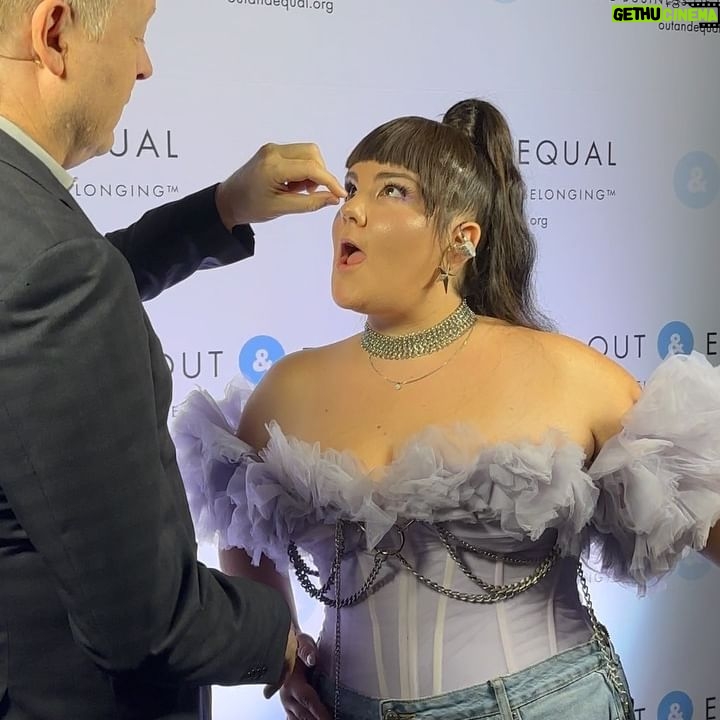 Netta Instagram - Especially in times like this when we can see hate crimes against the LGBTQ community on the rise, Organizations like Out and Equal are a beacon of light. It was an honor to perform for you today as we educate ourselves and support LGBTQ inclusion and belonging. I want to thank you Disney for sponsoring the event in light of everything that is happening. @disney @outandequal you've been driving me crazy in the comments to know what im wearing 👾 @stavofman.couture custom made this purple dream😁 styled by the great @itay_bezaleli