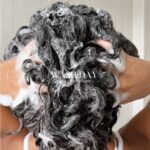 Nia Pettitt Instagram – #AD – My wash routine changed once I started double cleansing every week. My hair absorbed my styling products even more and my curls have more definition. I always recommend starting off with a clarifying shampoo first then a hydrating one so balance out your strands. For this wash routine, I used the @sheamoistureuk Black Castor Oil Shampoo with the Coconut & Hibiscus range. They make my wash routine feel easy and effortless as the products give enough slip to glide through and create long lasting definition. #sheamoisture #curlscoilsandconvos 🥥✨💕