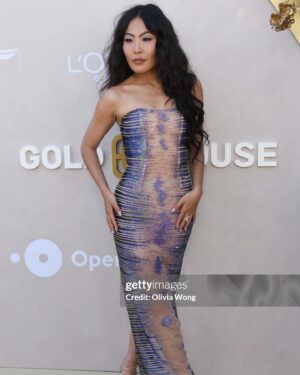 Nicole Kang Instagram - WE’RE GOLD ✨

thank you @goldhouseco for this night 

A true house with hosts who knit our family together:  @bingchen @jeremyntran @prabalgurung @padmalakshmi @genesis_usa 
thank you for feeding us mind body and soul 

As Bing said this event is so much more than a celebration of AANHPI talent. Every year a challenge emerges (as in every good Asian household) 
What else is possible? Who do we speak up for? And how will we show up for ourselves and one another this time around? 

Every year our global community gets closer and the global majority awakens to itself.  I feel so connected to our power at large on nights like these. The stories we’ve been told about ourselves in the past can stay there. Lucy Liu’s triumph through fire and pain was such proof of that. 

It has been the time to forge intersectional ties and tell stories together. I live and love by that. 
(Thank you Cynthia Erivo, John Chu, Michelle Yeoh for proof)

We are infinite.

Thank you for including me. Life is crazy y’all. 
It’s been hopeful and it’s been painful and I’m trying to show up the best I know how. So in the meantime,

Friends, let’s make something dope. 🫰🏽

My beautiful team:
styled by @anatanaka 
wearing @dolongofficial 
heels @alevimilano 
diamonds @gabrielandco & @sarahojewelry 
and of course…
MUP @linamourey 
Hair @grahamnation