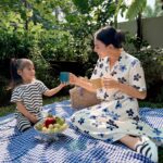 Nina Kozok Instagram - Unforgetable summer picnics with my little one. Wearing the limited edition collection by UNIQLO x Marimekko. Bold colors and motifs that are easy to mix and match. This collection launches today in all UNIQLO stores and online at UNIQLO.COM @uniqloindonesia #UNIQLOxMarimekko #UNIQLOIndonesia