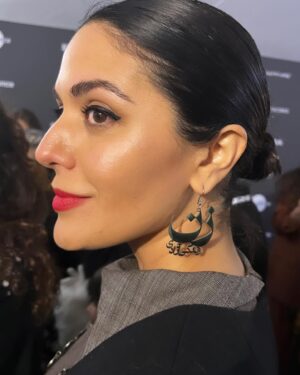 Niousha Noor Instagram - Wow... U.S. Dramatic Audience award?! This is incredible. Thank you!! @sundanceorg 

💚🤍♥️

It was an honor for me to be at Sundance for a movie about the Iranian-American experience, and even more honorable to have worn a Kurdish inspired design created by Kurdish-Iranian-American designer @jilaatelier, in memory of Kurdish-Iranian Mahsa Jina Amini — the 22 year old woman whose death at the hands of the Islamic Republic sparked the current uprising in Iran.

In this uprising, the regime is witnessing something they have systematically worked hard to prevent: unity. From Sistan Baluchistan in the southeast to Kurdistan in the northwest, the people have united to voice their disdain for a regime that's been oppressing them for 44 years. 

I know I don't save lives by wearing this or by talking about Iran at Sundance. But storytelling is a powerful tool in turning a page on prejudice and indifference. And I can tell you with the utmost confidence that Iranians at the biggest US independent film festival were very present and very vocal — and people are listening. 

I'm forever inspired by the brave revolutionaries in Iran who are the ones causing a perceptible shift in how Iranians are seen, and we as artists owe it to them to further expand on this empathetic shift and bring more and more real human — and Iranian — stories to life. 

With that, I'm beyond grateful for this movie, The Persian Version, for being a window into an Iranian-American experience, but at its core shining a light on the strength and resilience of Iranian women. 

Thank you @marakeshfilm for bringing your beautiful story to life. And a huge congratulations to everyone involved. I absolutely love my @tpv_film family. 

Woman. Life. Freedom. 
#زن_زندگی_آزادی 
💚🤍♥️

Earrings: @persian.jewelry 🙏🏼