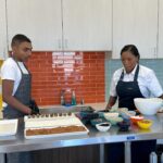 Nyesha Arrington Instagram - BIG congrats to the @childrensbureau Family resource center on their grand opening!! We had a lot of FUNNN learning about food as fuel 🔋& interactive recipes adults/kids can make together! My nephew Emmanuel Issac killed it as sous chef 💕 Here we made some simple date bites with nuts and spices and coconut oil 😋 #family #ribboncutting #familyresources #love #cookingdemo