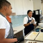 Nyesha Arrington Instagram - BIG congrats to the @childrensbureau Family resource center on their grand opening!! We had a lot of FUNNN learning about food as fuel 🔋& interactive recipes adults/kids can make together! My nephew Emmanuel Issac killed it as sous chef 💕 Here we made some simple date bites with nuts and spices and coconut oil 😋 #family #ribboncutting #familyresources #love #cookingdemo