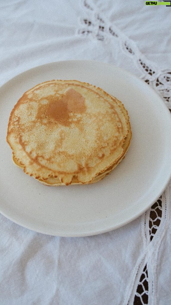 Olesya Rulin Instagram - Per request, the Russian crêpe pancake recipe, shared with me by my mother from our little Russian village is here. You will need : one cup of cows ( full fat) milk, preferably room temperature, one egg 1 teaspoon of baking powder A pinch of salt a teaspoon of sugar and flour. let me know if you try this recipe and send me DM’s of your Russian crêpes. I want to see your masterpieces. these are amazing warm as well as cold and in my homeland, we wrap up meats or cheese inside of them once they’re cold and make pancake rollup.