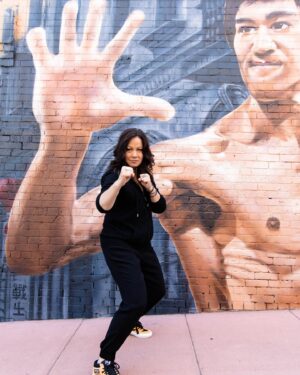 Olivia Cheng Instagram - Happy Warrior Premiere weekend! To launch our first 3 episodes of season 3, @brucelee murals around America were unveiled in NY, LA and here at 965 Clay Street in San Francisco, CA.  More to come but here’s a quick peek at the incredible work by @dj_agana and @vogue_tsk near the @wearebrucelee in Chinatown! Stream the first few episodes of #warriormax now on @streamonmax and 🙏🏼🙏🏼🙏🏼! PS Curious if you’ve already watched— whaddya think? Comment below 😃 #warriorhbomax #warriormaxseason3  HMU @beautybycrystal Styling @michelleaddisonstyle