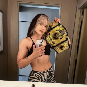 Paige Wooding Instagram - Watch #AEWDynamite tonight. The champ said so. 🌼