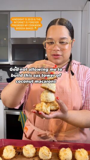 Paola Velez Instagram - Idk what I was thinking building this tower lol but if you want to get into this recipe and more like it, preorder my cookbook Bodega Bakes.

#coconutmacaroons #cheftips #coconut #pastrychef #easyrecipes #besitosdecoco #dominicanchef #caribbeanfood #caribbeanheritagemonth