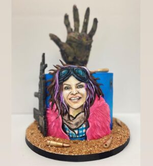Paola Lázaro Instagram - My family surprised me with a cake from the very talented @sonojones from @commonbondcakes to celebrate the Season Finale! 💜 #thewalkingdead #twdfamily #twdprincess #Thankful 💓