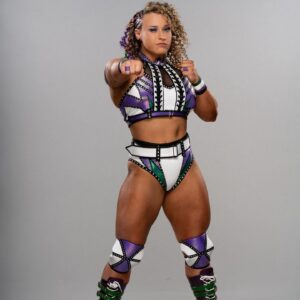 Patricia Parker Instagram - Facebook reminded me that 14 years ago today, I did my very first promo in front of 11 people. 

Serious question though - do I bring back this glow in the dark wrestling gear? 👀