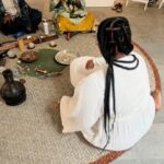 Patrisse Cullors Instagram - Grateful to have been asked by @southernguildgallery to support the opening ceremony for their LA launch. @andiledyalvane and the entire sound healers from South Africa reminded me that the diaspora is always asking for us to gather in ceremony. Our ancestors want us to call them in to play and heal. I practice IFA, I pray to my ancestors, I believe in the power of African spirituality and the way it heals ALL of us. My work as an artist and abolitionist isn’t separate from spirit. I am grateful that at 40 years old I get to keep digging into my legacy and my history. I may have been stolen from Africa but Africa will not be stolen from me. Camagu! Aśe oooooooooooooo! 📸 @asharaekundayogallery @blublakwomyn 🎥 @alexandrealirezadorriz Dress: @marahoffman Jewelry: @santanaandco and @sincerely_antoinette