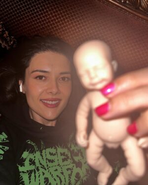 Patti Harrison Instagram - If given the chance i think id be a good mom because id hold the baby like this. And when people in public would yell at me for holding it this way, id say “im so sorry. This better?” Then I’d hold it the right way …and everyone would smile 😊
(P.S- she is awake in these photos! I had her close her eyes for the flash 😌)