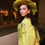 Paulina Chávez Instagram - incredibly honored to be wearing Gianni Versace 1992 archive collection to the world premiere of The Long Game. thank you to the team for making this all a reality <3 stylist: @christian_ramireztv hair&mua: @beautybyalyssag #CRStyles @versace , @paristexas_it , @lisafreede