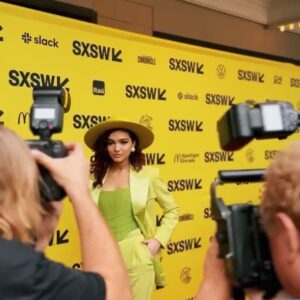 Paulina Chávez Instagram - incredibly honored to be wearing Gianni Versace 1992 archive collection to the world premiere of The Long Game. thank you to the team for making this all a reality <3

stylist: @christian_ramireztv 
hair&mua: @beautybyalyssag 
#CRStyles @versace , @paristexas_it , @lisafreede