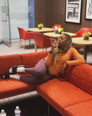 Phoebe Robinson Instagram - I CAN. FUCKING. DO. ANYTHING. I started running last March as a new hobby. Fell in love with it. Did some races. And last September, (RED) asked me to run this race for them. And I did it! Wow. Surprising yourself is the coolest thing! Cannot wait to do another marathon! 

Running the @bostonmarathon with a chest cold is a specific kind of masochistic hell. 10 out of 10 do not recommend. Haha. But for real, the race was a surreal, incredible, once in a lifetime experience. No matter how much you prep, train, when it’s race day, you just have to meet the moment & see what you’re really made of. I saw ppl vomiting, limping, struggling; my parents lost count of how many people they saw pass out at or near the finish line. The Boston Marathon is a beast like no other and sick or not, I refused to give up.

1) Post race right after I go my medal, my dad took this photo. I was so happy, tired, and proud of myself. Baby is a marathoner!
2) On Saturday, @bankofamerica invited me and the rest of Team (RED) to a Red Sox game and I got to represent (RED) on the field during special recognition before the game started. Jumpsuit: @wearewildfang 
3) Team @red - @dan_churchill, @jeffreymce, @bellezel & I - got to pose with the World Champion trophy. Neat!
4) My parents showed up looking fly AF in their matching Boston Marathon jackets that I got them. 🥰🥰
5) (RED) gang pre-race.
6) Me right before getting my marathon cherry popped.
7) Saw so many great signs thruout the race. This made me stop and laugh so hard.
8) Heartbreak Hill was no joke. Truly was hard. About 13 miles into the marathon, it felt like someone was pressing down/sitting on my chest, but I remained calm and stuck to my plan: running up HH, which was between miles 20 and 21 and lasted 1/2 mile, without stopping. And I did it!
9) This was towards the end. I was fighting for my life for the last 4 miles. I told myself to keep moving. Never stop. And remember my why: I’m doing this for (RED). It’s bigger than me. But also: this IS for me. To test myself mentally and physically.
10) My dad took the photo. He tidied up all the tables behind me because they were messy with food. #DadsOfInstagram #BostonMarathon