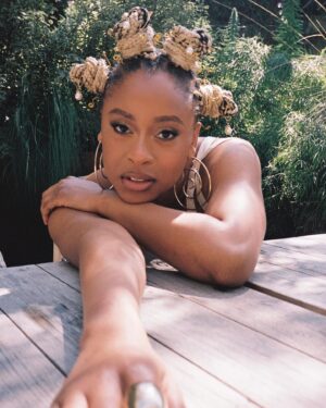 Phoebe Robinson Instagram - Hey, heauxes! I’m moisturized, minding my business, and drinking my green juice! 

📸: @valentinatakespics
Hair: @sabsthegoodgirl
Makeup: @alanapalaumakeup
Styling: @elenalark assisted by @kitoogarcia @iamnot_shialabeouf @mia_navarro_
Top: @sandyliang
Earrings: @lauraestradajewelry
Ring: @jenniferfisherjewelry