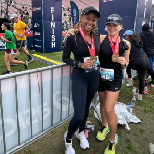 Phoebe Robinson Instagram - Not even this goofy ass bitch stepping into the shot when she saw I was getting my picture taken can take away from the fact that I ran my first ever half marathon today! 🤣🤣🤣🤣#RoseBowlHalfMarathon is NO JOKE! Good amount of hills. Tested my mental strength. But I never wanted to quit. I knew it was gonna be worth it! Just had to push thru. Especially when I was fighting for my life at mile 10. Phil Collins “In the Air Tonight” got me together so well, I listened to it twice in a row. Then at mile 12 when I was really fighting for my like Whitney Houston’s “I’m Every Woman” carried me thru. Thanks, @mrshanlui, for running with me! She def finished before me, but it was so nice knowing she was gonna be there waiting for me at the finish line. Next up: Central Park Half Marathon in Feb 25th. Until then, I’m going to be wearing this medal all day like an obnoxious asshole. YOU WILL GET SICK OF ME AND IONNO CARE. 🤣🤣🤣