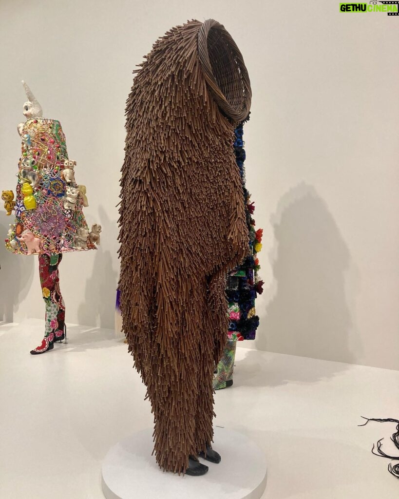 Piper Perabo Instagram - Ever since I saw a film of @nickcaveart Soundsuits dancing on his Instagram, I have been waiting to see his art in real life. Finally it happened, his show #forothermore at @guggenheim will bend your imagination and open your eyes. Run don’t walk, or better still, dance over there. (A curator told me Cave recommends seeing the floors in the order 4, 2 then 5. It is cool that way.) ✨✨✨✨✨🖤🌸 • Nick Cave's (@nickcaveart) art practice interrogates promises, fulfilled or broken, that late 20th and early 21st centuries offered to the “other.” Our newest exhibition, "Nick Cave: Forothermore," highlights the development of Cave’s work while creating space for those who feel marginalized by dominant society and culture—especially working-class communities and queer people of color. - @guggenheim