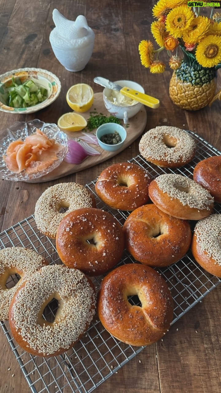 Poh Ling Yeow Instagram - 🥯 I’ve been craving homemade bagels for weeks! The recipe will tolerate up to 1 cup of sumthin’ sumthin’ - blueberries, choc chips etc. Also, in case u might ask - Skeleton & goldfish bowl is thrown & glazed by @graemerichardson67 , painted by me. Jamface tea towel designed by @sweetpetite77 but no longer available - sorry 😢. 2 tsp (7g) yeast 2 Tbs honey 2/3 cup tepid milk 3 cups plain bread flour (normal plain flour works but texture won’t be as chewy) 1 cup plain wholemeal flour 1 tsp salt 1 - 1 1/3 cup tepid water 1 egg, whisked 1/3 cup sesame or poppy seeds or sea salt Mash yeast & honey together. Add milk and stir to dissolve. Cover & rest for 20 mins or until surface is foamy. Combine the flours, salt, yeast honey milk mix & only 2/3 of the water. Knead into a pliable dough adding the remaining water if needed. The dough should knead easily & should not stick to the bench surface even without the aid of flour. Cover with damp tea towel to rise until double its original size in a warm draught free spot. Punch down dough and cut into 10 even pieces. Roll each piece into a 2cm wide sausage. Squash down one tip, bring the other tip to sit on the flattened tip and form a ring. Pinch around it to secure (see reel if unsure). Flip it over and rest on a 10x10cm square of baking paper. Repeat until all the rings are formed. Cover with a damp tea towel and allow to double in size again in a warm, draught free spot. Preheat oven to 170*C FF. Boil the bagels in plenty of water (about 30 secs each side). Rest on a clean tea towel to absorb excess water. Transfer to baking trays lined with baking paper leaving a 2cm space between the bagels. Baste generously with the egg. Sprinkle or dip in seed of choice. Bake for about 20 mins or until golden and fill with whatever your heart desires! Enjoy and oh, these freeze well in an airtight container or snap lock bag ♥️ PS Quick cucumber pickle is simply shaved crunchy part of 1 continental cuke, 1 tsp salt, 2 Tbs sugar, splash of white wine or cider vinegar. Taste then feel free to play with the balance for a sweeter, saltier or more sharp finish.