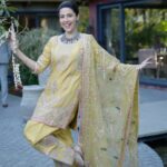 Poppy Jabbal Instagram - Amritsari Tikka ! Feeling the vibe in punjab Outfit by @akritibyritika, making me look pretty in yellow 📷 @itskrajofficial #punjab #amritsar #patola